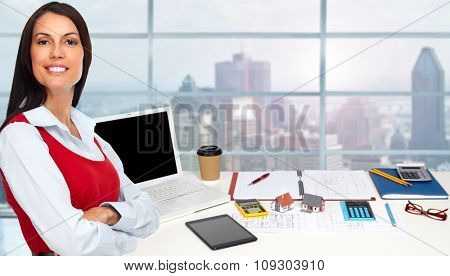 Woman architect in amodern office. Construction and renovation concept.