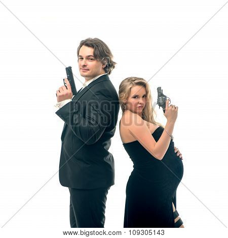 Pregnant fashion woman and husband in gangsta style