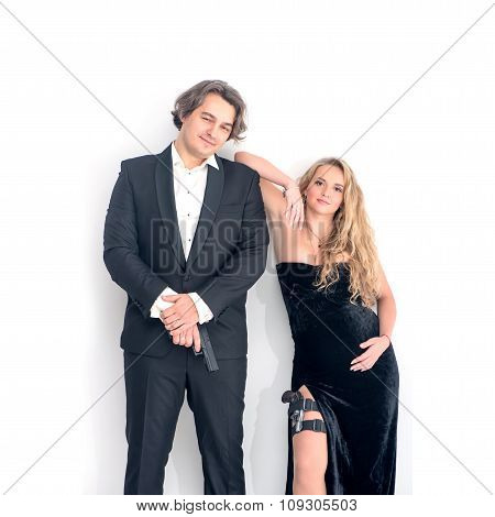 Pregnant fashion woman and husband in gangsta style