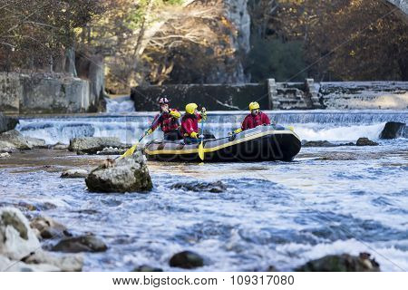 Adventurous Group Doing White Water Rafting The Rapids Of River Voidomatis In Konitsa