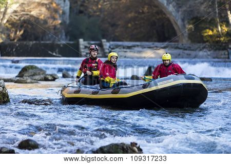 Adventurous Group Doing White Water Rafting The Rapids Of River Voidomatis In Konitsa