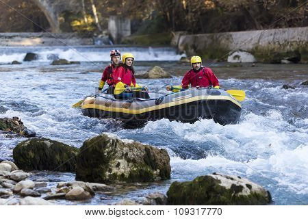 Adventurous Group Doing White Water Rafting The Rapids Of River Voidomatis In Konitsa