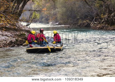 Adventurous Group Doing White Water Rafting The Rapids Of River Voidomatis In Konitsa