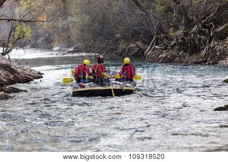 Adventurous Group Doing White Water Rafting The Rapids Of River Voidomatis In Konitsa