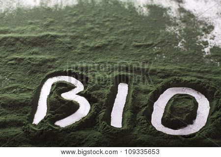 Spirulina raw powder on white background