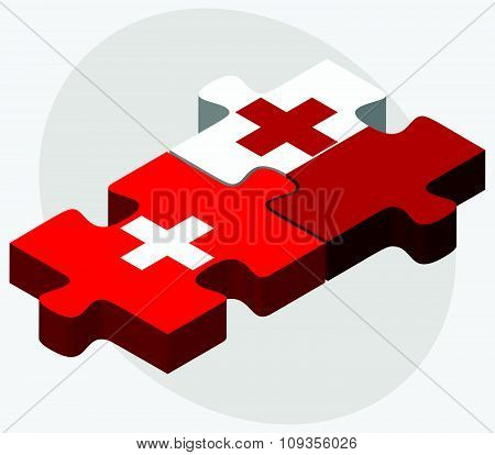 Switzerland And Tonga Flags