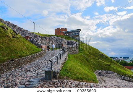 Tourists Climb The Mountain Gediminas The Rocky Road To The Tower Of Gediminas