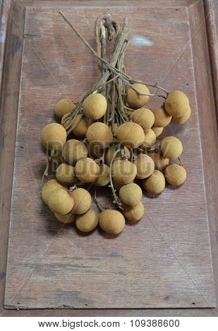 Longan Thai fruit on wood board