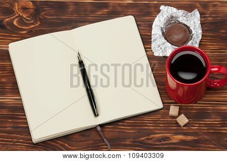 Blank Open Notepad. Cup Of Coffee. Wooden Background