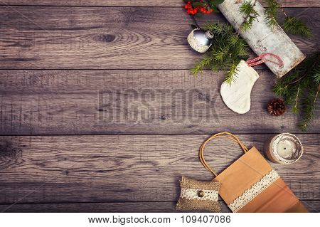 Christmas background on wooden table and copy space, shopping bag