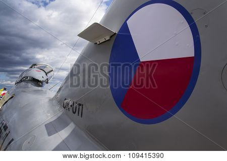 Detail of jet fighter aircraft with open cockpit
