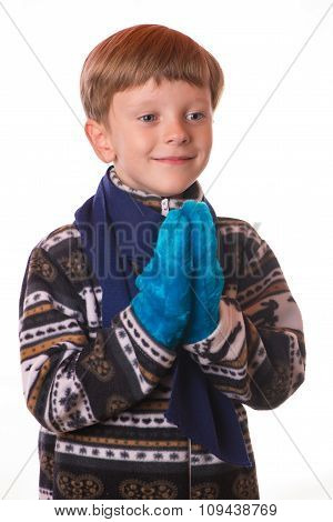 Portrait Of The Boy In Warm Clothing.