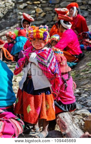 Quechua Girl And Family In A Village In The Andes, Ollantaytambo, Peru