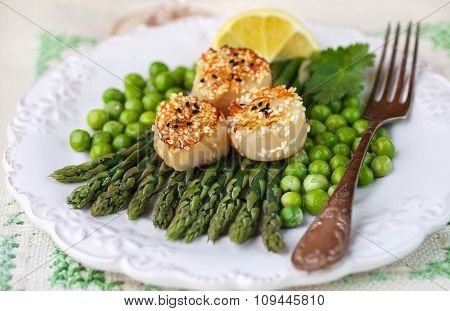 A Delicious Dinner Of Roasted Scallops, Asparagus And Green Peas