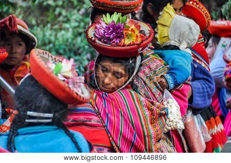 Quechua Woman In Colorful Hat In A Village In The Andes, Ollantaytambo, Peru