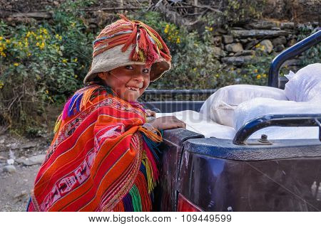 Playful Quechua Boy In A Village In The Andes, Ollantaytambo, Peru