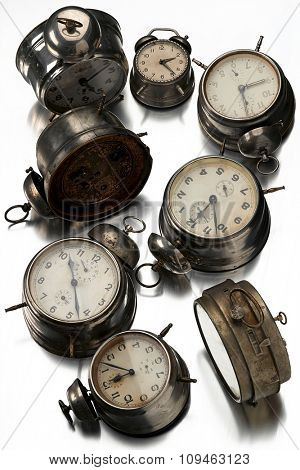 vintage alarm clocks on white