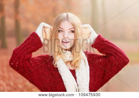 Portrait Of Pretty Smiling Woman In Earmuffs.