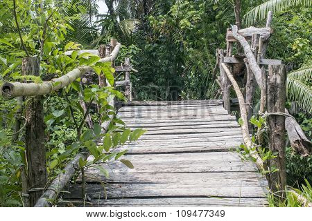 wooden pedestrian bridge across the river