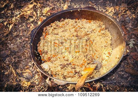 Cast Iron Pot Outdoors, Cooking On A Fire.