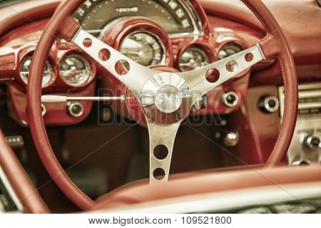 Sleza, Poland, August 15, 2015: Close Up On Corvette Vintage Car Steering Wheel And Kockpit On  Moto