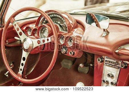 Sleza, Poland, August 15, 2015: Close Up On Corvette Vintage Car Steering Wheel And Kockpit On  Moto