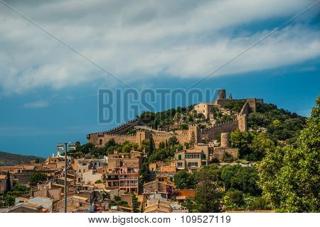 Capdepera castle on green hill in Mallorca
