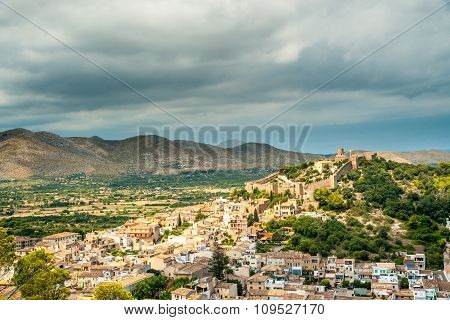 Capdepera castle on green hill in Mallorca