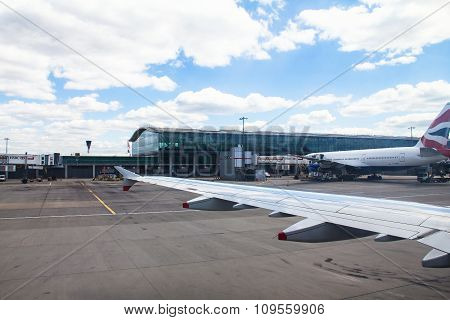 Taxiing Aircraft Airbus A-320  After Landing In Heathrow Airport . London. Uk