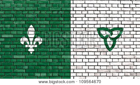 Flag Of Franco-ontarian Painted On Brick Wall