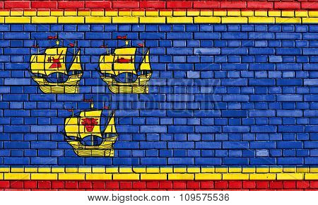 Flag Of Nordfriesland Painted On Brick Wall