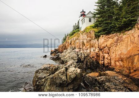 Cliff Side Maine Lighthouse on a Cloudy Day