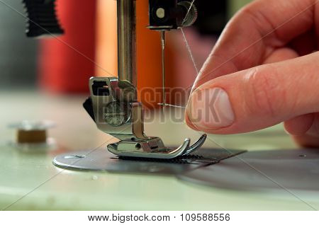 Threading The Needle In A Sewing Machine