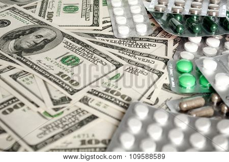 Hundred Dollar Bills And Pills Blisters Close-up