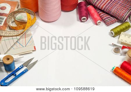 Various Sewing Supplies On A White Background With Space For Text