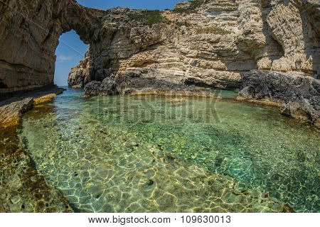 Unique And Scenic Arch In The Cliffs, Paxi, Greece