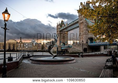 Fountain in front of Tower Bridge at Sunset