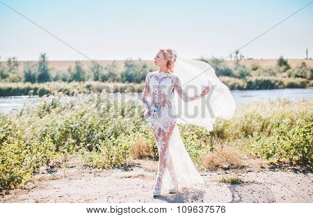 Beautiful young bride in white dress