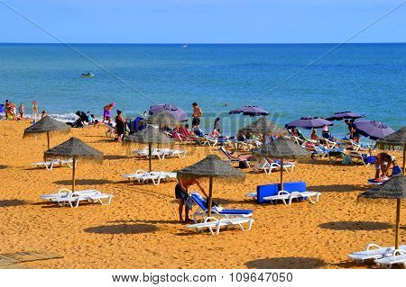 Families enjoying the sun on Albufeira Beach