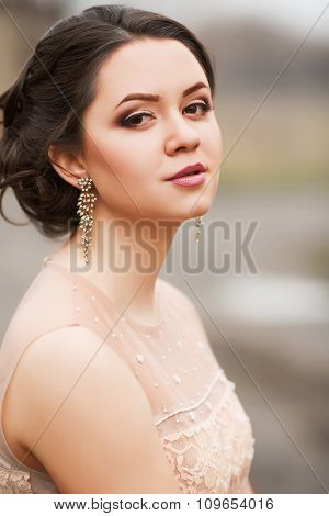 Portrait Of Beautiful Young Woman With Makeup In Fashion Clothes