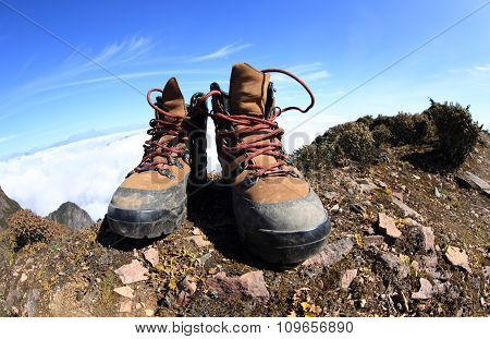 hiking boots on beautiful mountain peak