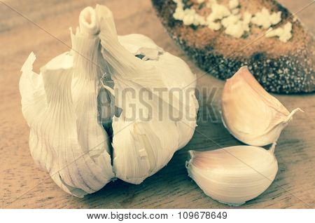 Head Of Garlic And Two Lobules