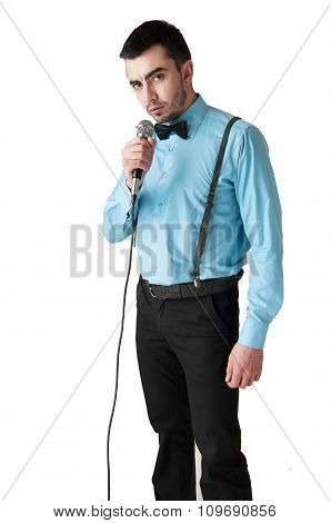 Gallant Man Holding A Microphone - Isolated On White Background.