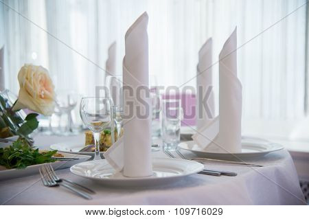 Starched table napkins.