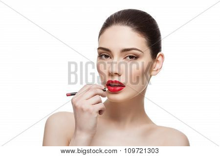 Beautiful girl with lip pencil