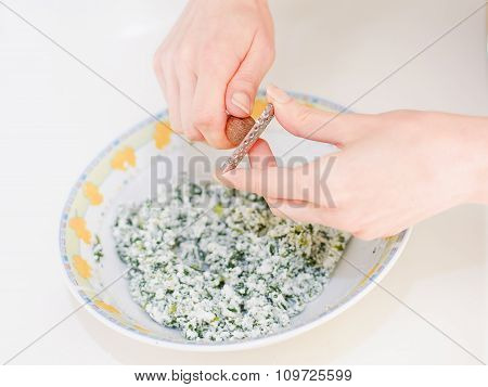 Grating Nutmeg Dough With Ricotta