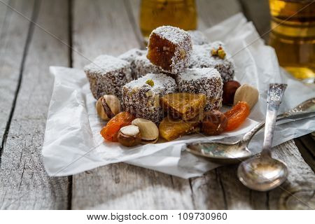 Traditional turkish sweet lukum served with tea