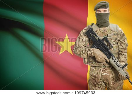 Soldier Holding Machine Gun With Flag On Background Series - Cameroon