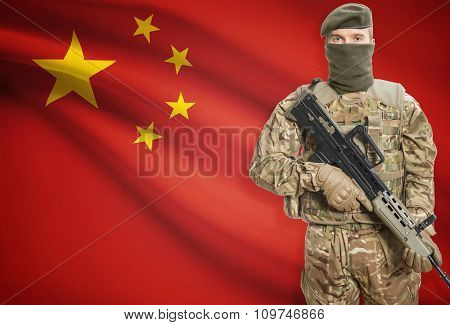 Soldier Holding Machine Gun With Flag On Background Series - People's Republic Of China
