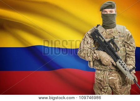 Soldier Holding Machine Gun With Flag On Background Series - Colombia